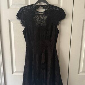 Classic Black Dress with Cap Sleeves – Effortlessly Elegant